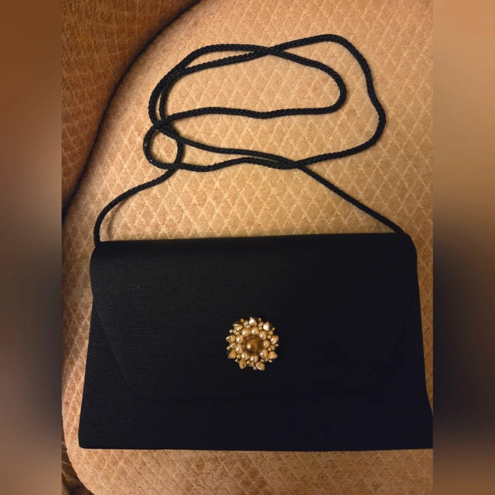 Elegant Black Clutch with Gold Accent - Picture 1 of 7